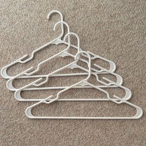 Set of White Plastic Hangers